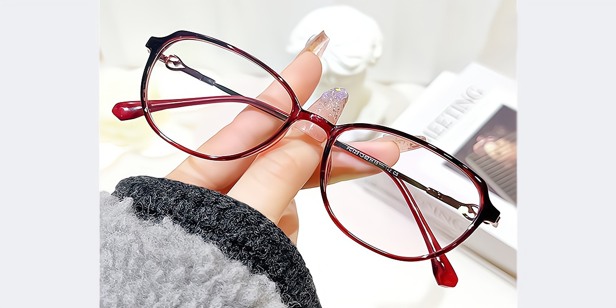 Red Oval Elaborate Horn Mixed Materials Eyeglasses